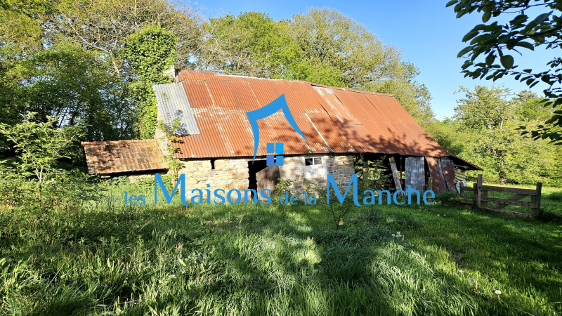 Magnifique maison normande en pierre avec dépendances sur un terrain arboré de plus de 8 000 m²